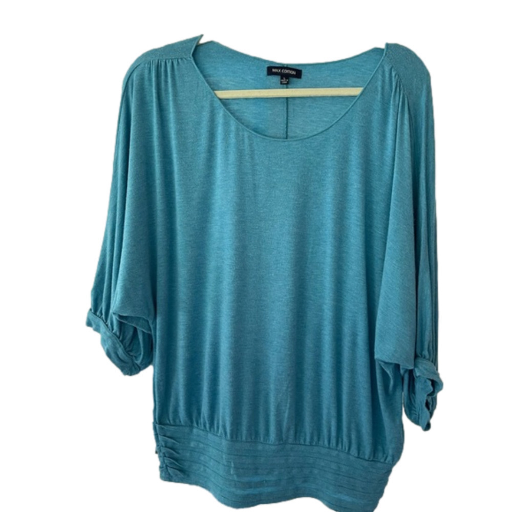 MAX Studio blue top.
